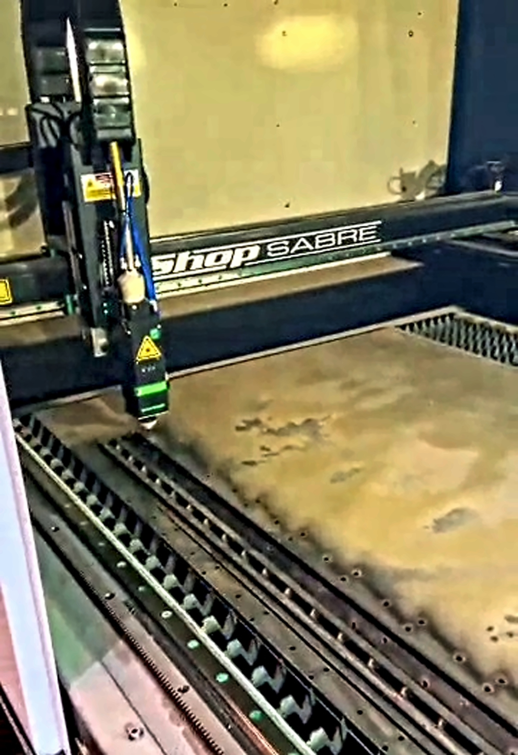 Laser cutter actively cutting metal
